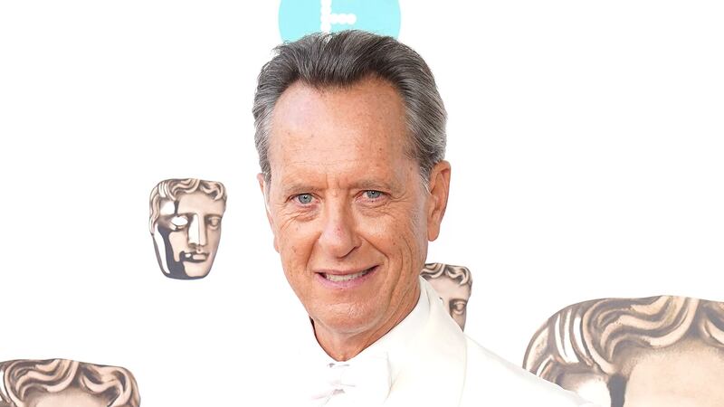Richard E. Grant has announced the death of his mother (Ian West/PA)