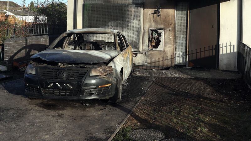 The torched car and damaged property at Weaver's Grange. Picture by Mark Marlow
