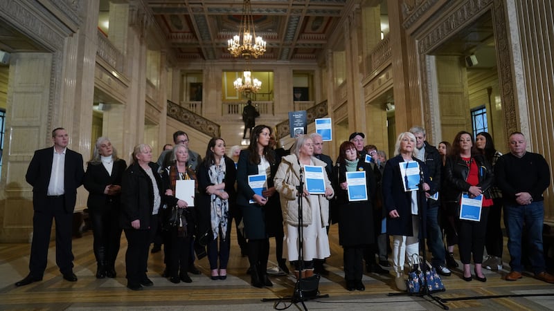 Margaret McGuckin (front right), of victims’ group Savia, speaks to the media in the Great Hall at Stormont