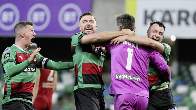 The Glentoran players celebrate Monday night&#39;s Irish Cup semi-final win over Cliftonville 