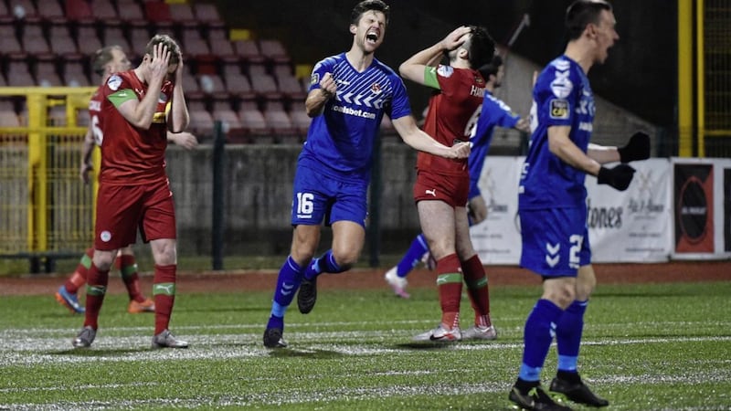 Crusaders striker Adam Lecky celebrates Ben Kennedy&rsquo;s late equaliser at Solitude on Saturday 