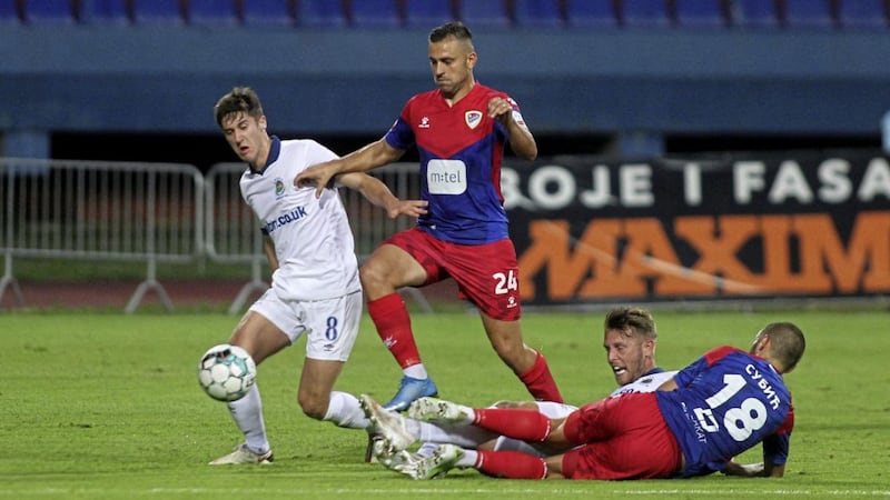 Trai Hume (left) in Europa Conference League action with Linfield. 
