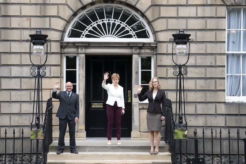 The Bute House Agreement came in when Nicola Sturgeon (centre) was first minster, and made Scottish Green co-leaders Patrick Harvie (left) and Lorna Slater (right) ministers in the Scottish Government.