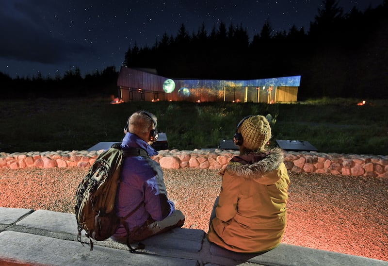Visitors watching an outdoor film at OM Dark Sky Park and Observatory. Picture from Mid Ulster Council