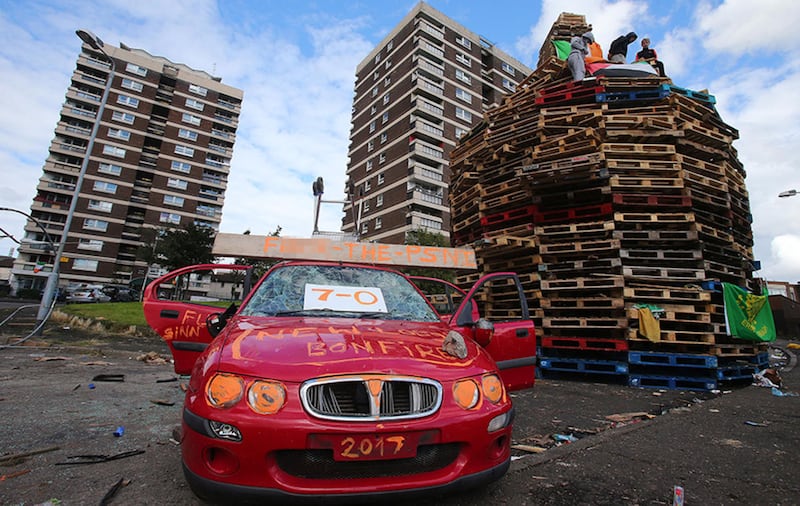 A car is placed at the New Lodge bonfire in north Belfast&nbsp;
