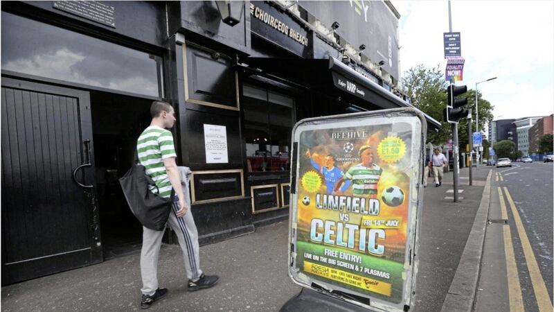 The Beehive Bar in West Belfast gets set for the Celtic V Linfield game. Picture by Hugh Russell 
