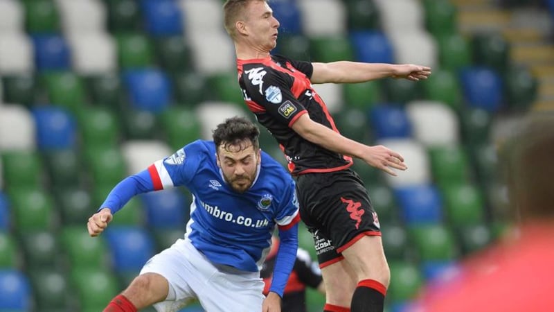 Crusaders' Andrew Mitchell and Linfield&rsquo;s Ross Gaynor battle for the ball during Saturday's game at Windsor Park<br/>Picture by Pacemaker&nbsp;