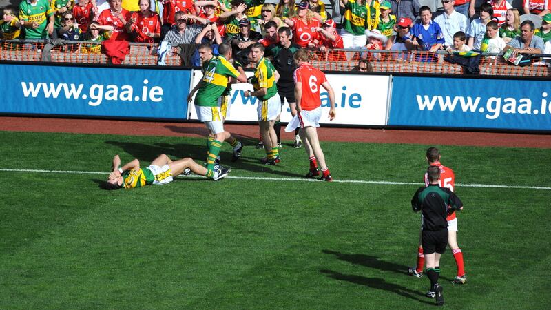 Kerry’s Aidan O’Mahony (grounded) clutches his face after an incident with Donncha O’Connor which resulted in a red card for the Cork man in the 2008 All-Ireland SFC semi-final replay. O’Mahony has since admitted his shame and embarassment for feigning injury to get an opponent sent-off