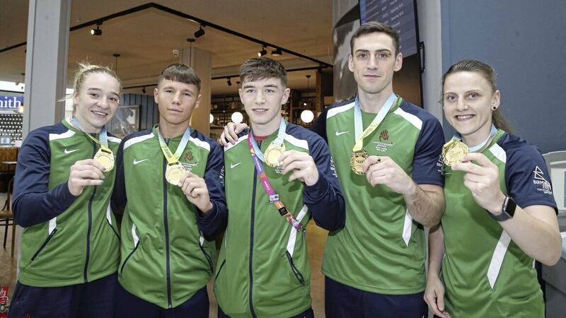 Boxers Dylan Eagleson, Aidan Walsh, Amy Broadhurst, Jude Gallagher, and Michaela Walsh pictured after returning to the north from Birmingham yesterday. Picture by Hugh Russell 