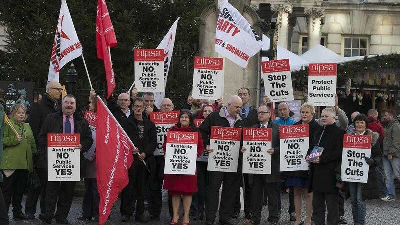 Nipsa protest yesterday outside Belfast City Hall over cuts to the public sector. Picture by Hugh Russell. 