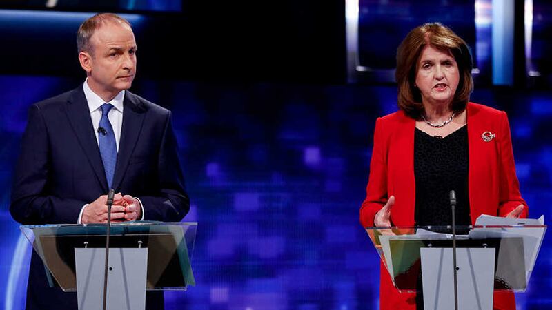 Fianna Fail Leader Micheal Martin and Tanaiste Joan Burton  during the last TV Debate on RTE Prime Time before the general election