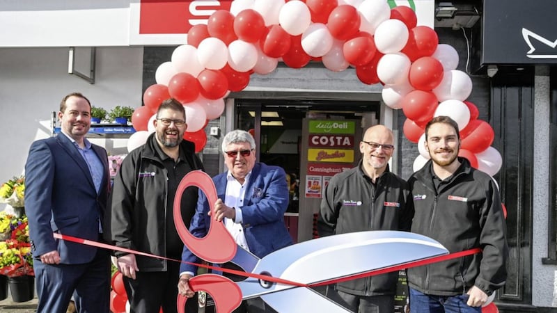 Opening the Dublin Road Newry Spar with the help of their most loyal customer Frank Hunt (centre) are (from left) Jamie Graham from Henderson Group, store owners Craig and Alistair Crossey-Truesdale, and store manager Johnathon Crossey-Truesdale 