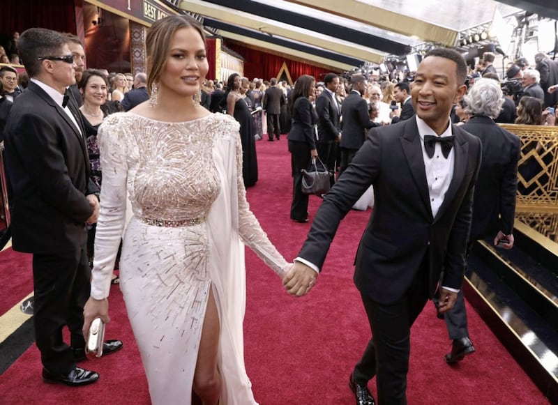 Chrissy Teigen and John Legend arrive at the 2017 Oscars. Picture byMatt Sayles, Invision/AP
