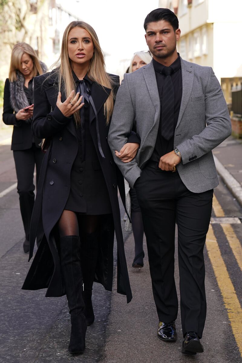 Georgia Harrison and Anton Danyluk outside Chelmsford Crown Court, Essex, after the adjournment of a confiscation hearing for her former partner, Stephen Bear, following his conviction for voyeurism and two counts of disclosing private sexual photographs and films with intent to cause distress
