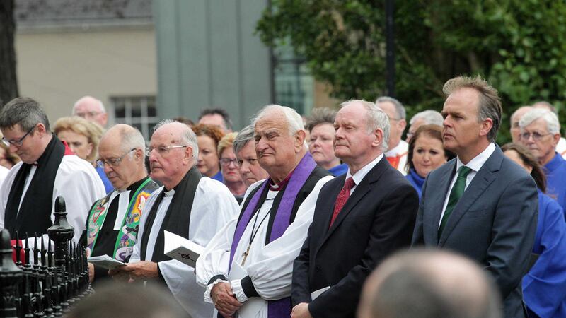 Former Archbishop of Armagh Robin Eames and Deputy First Minister Martin McGuinness at the funeral of Bishop Edward Daly