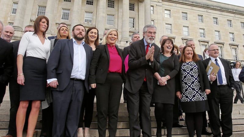 Sinn Fein President Gerry Adams greeting Japanese tourists at Parliament Buildings, Stormont. Picture by Mal McCann