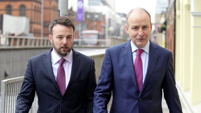 SDLP leader Colm Eastwood MLA and Fianna F&aacute;il leader Miche&aacute;l Martin arriving at a press conference in Belfast last month. Picture by Mal McCann 