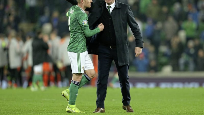 Northern Ireland manager Michael O&#39;Neill and captain Steven Davis at the end of Saturday night&#39;s 0-0 draw with the Netherlands at Windsor Park. Picture by PA 