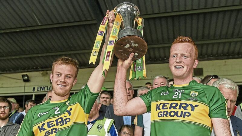 Joint captains Fionn Fitzgerald, left, and Johnny Buckley of Kerry lifting the cup after the Munster final win over Cork Picture by E&oacute;in Noonan/Sportsfile 