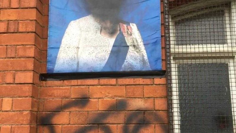 A portrait of Queen Elizabeth at the front of Derriaghy Orange Hall was defaced in the attack. Picture from Orange Order 