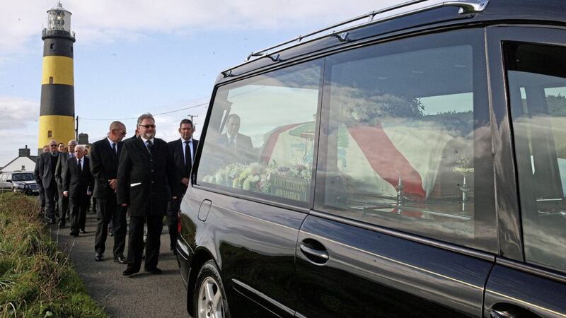 Mourners gather for the funeral of retired lighthouse attendant, Henry Henvey in Killough, Co Down. Photo by Bill Smyth 