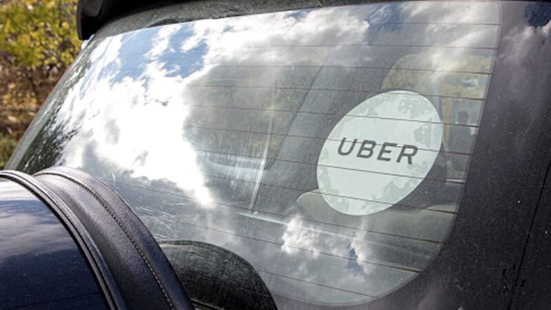 Uber narrowed net losses to 891 million dollars (&pound;701.5 million) from April to June 