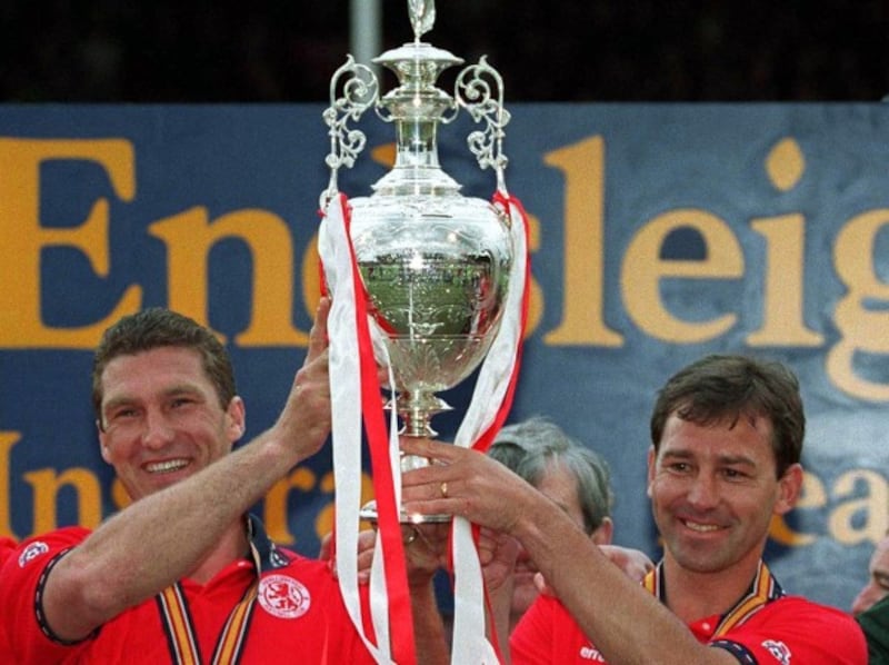 Middlesbrough's Nigel Pearson and Bryan Robson hold the division one trophy