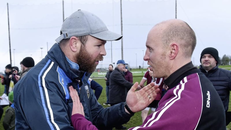 University College Dublin John Divilly, left, congratulates St Mary's manager Paddy Tally after the final whistle of Saturday's Sigerson Cup final mat the Connacht GAA Centre in Bekan, Co. Mayo <br />Picture by Sportsfile