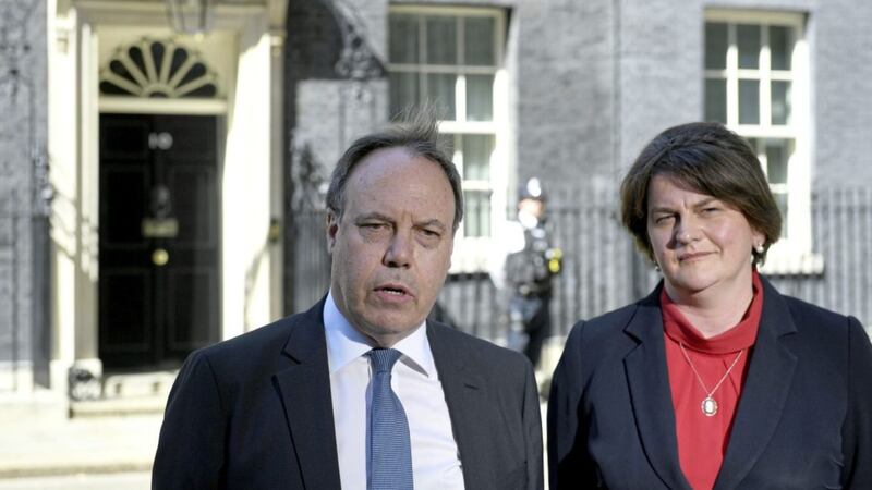 DUP leader Arlene Foster and the party's deputy leader, Nigel Dodds, leave Downing Street following a meeting with British prime minister Theresa May