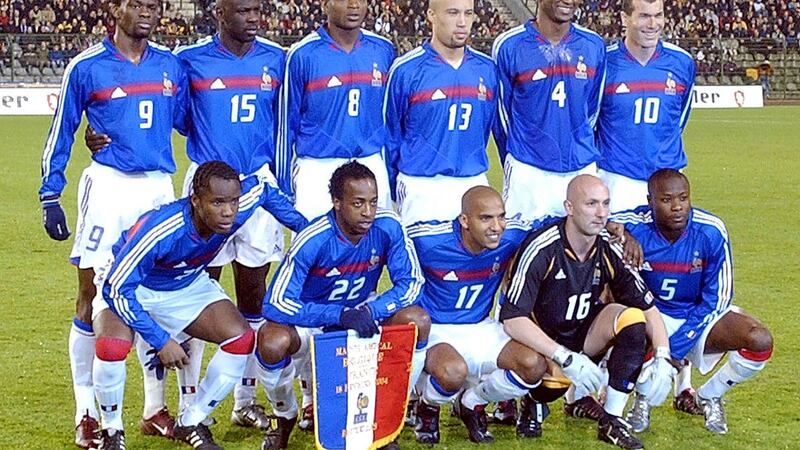 France players prior to their match against Belgium in Brussels on Wednesday February 18 2004. <br />Players are from rear, left to right: Louis Saha, Lilian Thuram, Marcel Desailly, Mikael Silvestre, Patrick Vieira, Zinedine Zidane. <br />Front row, left to right: Peguy Luyindula, Sidney Govou, Olivier Dacourt, Fabien Barthez and William Gallas