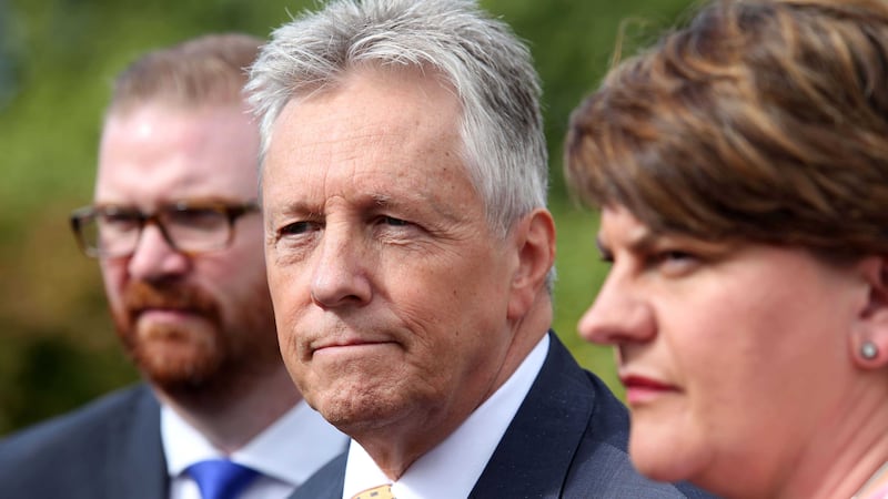 DUP leader Peter Robinson and assembly members Arlene Foster and Simon Hamilton at Stormont Castle. Picture by Mal McCann