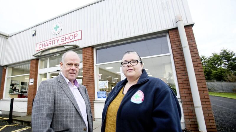Blythswood Ireland chief executive Gary Anderson and shop assistant Paula McCullough outside the charity shop on Antrim&rsquo;s Greystone Road 