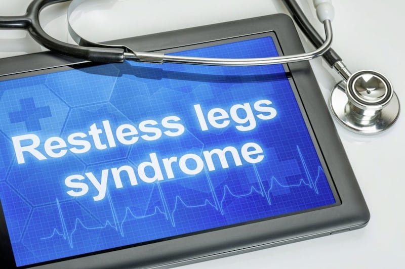 Tablet with the diagnosis Restless legs syndrome on the display 