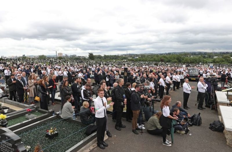 &nbsp;A crowd listening to former Sinn Fein president Gerry Adams speak during the funeral of former leading IRA figure Bobby Storey.