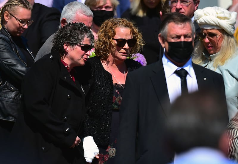 &nbsp;Geraldine during the funeral of her husband John and childrenTomas and Amelia Mullan at St Pius X Parish Church in Moville