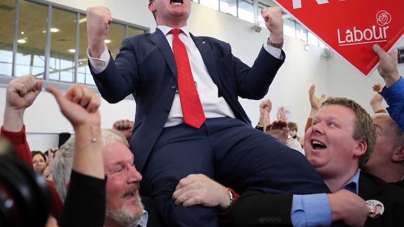 Labour candidate Alan Kelly is hoisted into the air as he celebrates being elected during the general election 2016 count at presentation Secondary school in Thurles Tipperary. Picture by&nbsp;Chris Radburn, Press Association