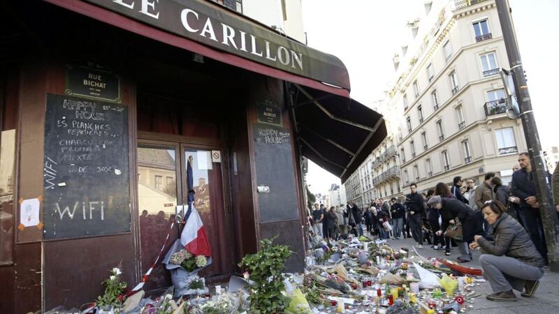 Tributes are left at the La Carillon restaurant in Paris, following the attacks in the French capital which are feared to have killed around 129 people last year. France remains under a state of emergency after the attacks. Picture by Steve Parsons, Press Association