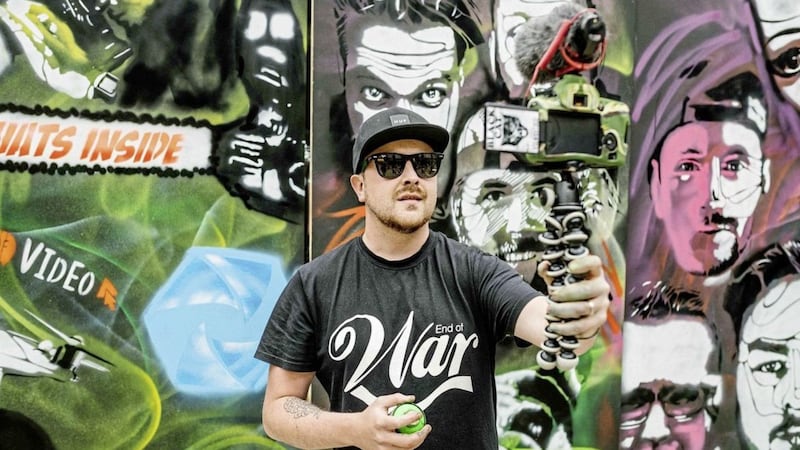 Street artist Dean Kane created a live graffiti installation at Bullitt in Belfast inspired by the programme for this year&#39;s Power of Video conference 