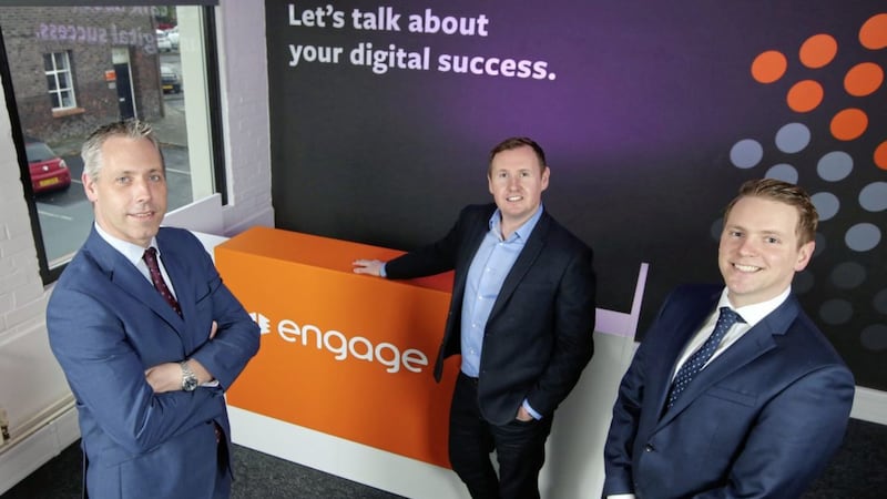 Engage managing director Steven Cassin (centre) with Bank of Ireland&#39;s David Ramsey (adviser at the Belfast City branch) and Gavin Kennedy (director of business banking). Photo: Kelvin Boyes / Press Eye 