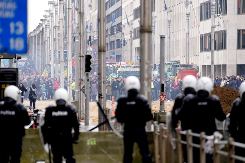 Dozens of tractors sealed off streets close to European Union headquarters where the 27 EU farm ministers are meeting to discuss the crisis in the sector (AP)