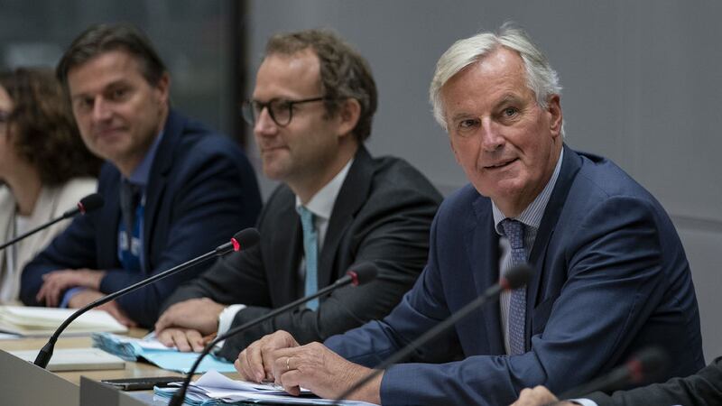 European Union chief Brexit negotiator Michel Barnier, right, sits along with his team during a meeting with Britain's Brexit Secretary Stephen Barclay at the European Commission headquarters in Brussels&nbsp;