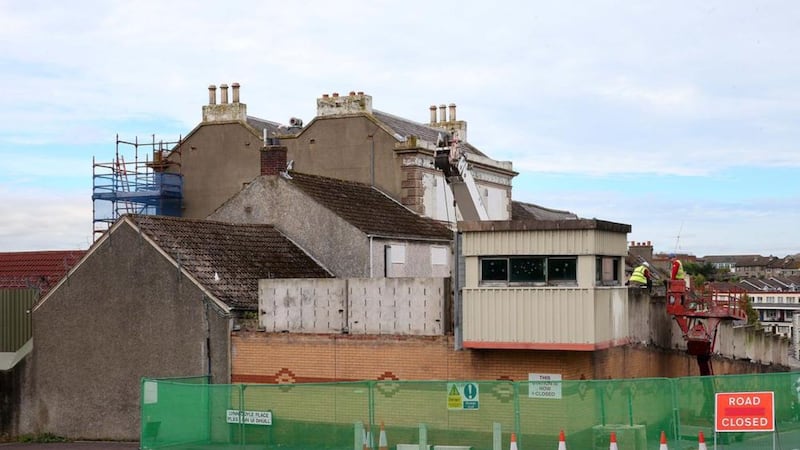 Demolition begins to remove the blast wall and sangar from the former PSNI station in Downpatrick, Co Down. Picture by Mal McCann. 