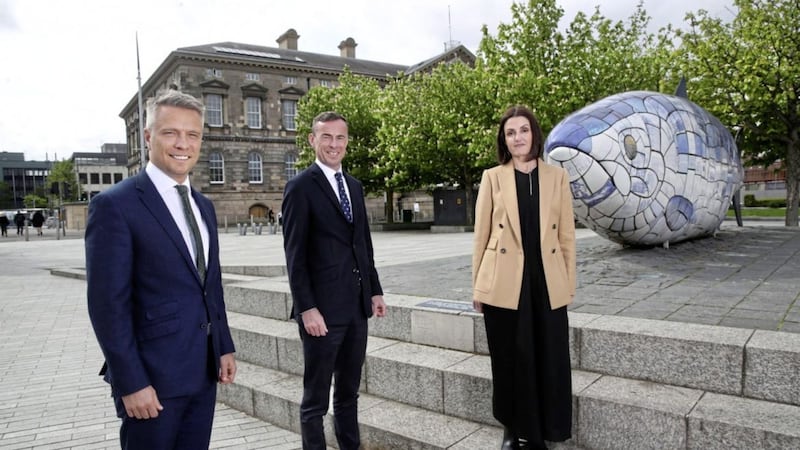 Pictured in Belfast at the announcement of 2022 EY Entrepreneur of the Year short list are Rob Heron, partner lead for the EOY programme, with Northern Ireland finalists Jacqueline O&rsquo;Reilly (owner and director of KonFloor) and Andrew Lynas (group managing director at Lynas Foodservice) 