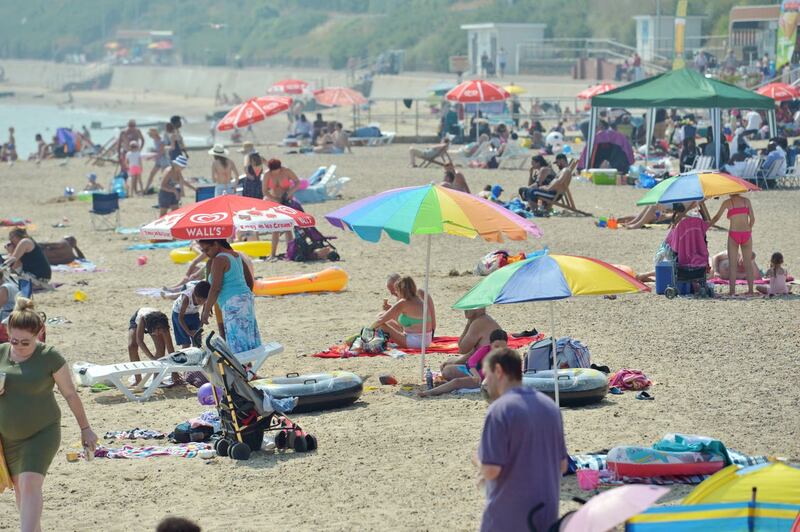 People on an Essex beach during a 2018 heatwave