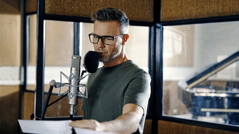 Gary Barlow wearing glasses from the new Specsavers collection 