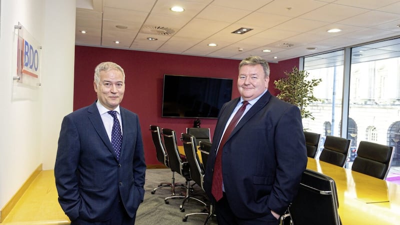 Pictured in BDO&#39;s new city centre office on Donegal Square are the firm&#39;s senior Northern Ireland partner Nigel Harra (left) and managing partner Brian Murphy 