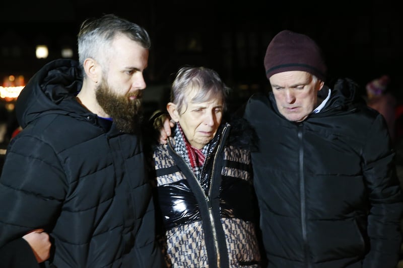 Natalie McNally's brother Niall and parents Bernadette and Noel at the vigil in Lurgan. Picture by Philip Walsh