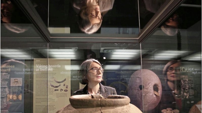 Dr Eleanor Ghey among the&nbsp;substantial collection of artefacts and treasure on display. Picture by Hugh Russell