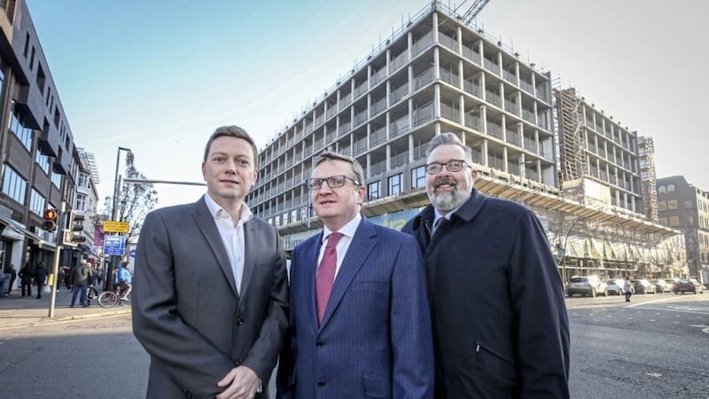 Pictured outside the Merchant Square development are: Cllr Donal Lyons; Gareth Graham from Oakland Holdings; and PwC NI chair, Paul Terrington. 