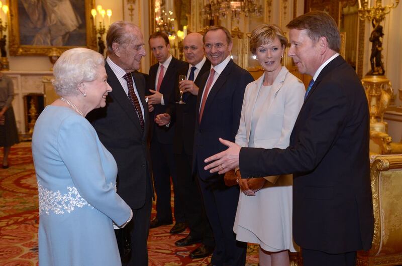 The Queen and the Duke of Edinburgh meeting Julie Etchingham and Bill Turnbull during the annual Civil Service Awards Reception at Buckingham Palace in 2015 